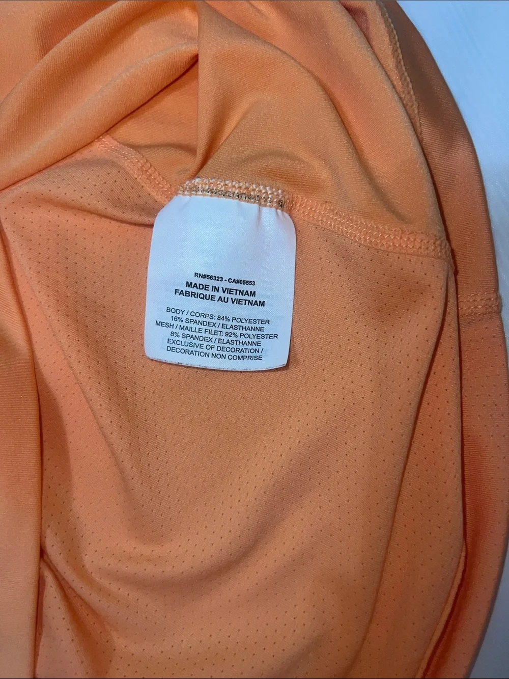 Nike Women's Peach-Orange Racerback Tank with Black Swoosh